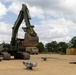 Excavator Moves into Position