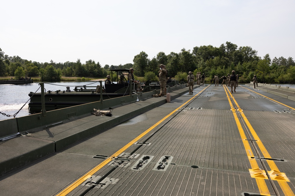 Soldiers Construct Bridge on Water