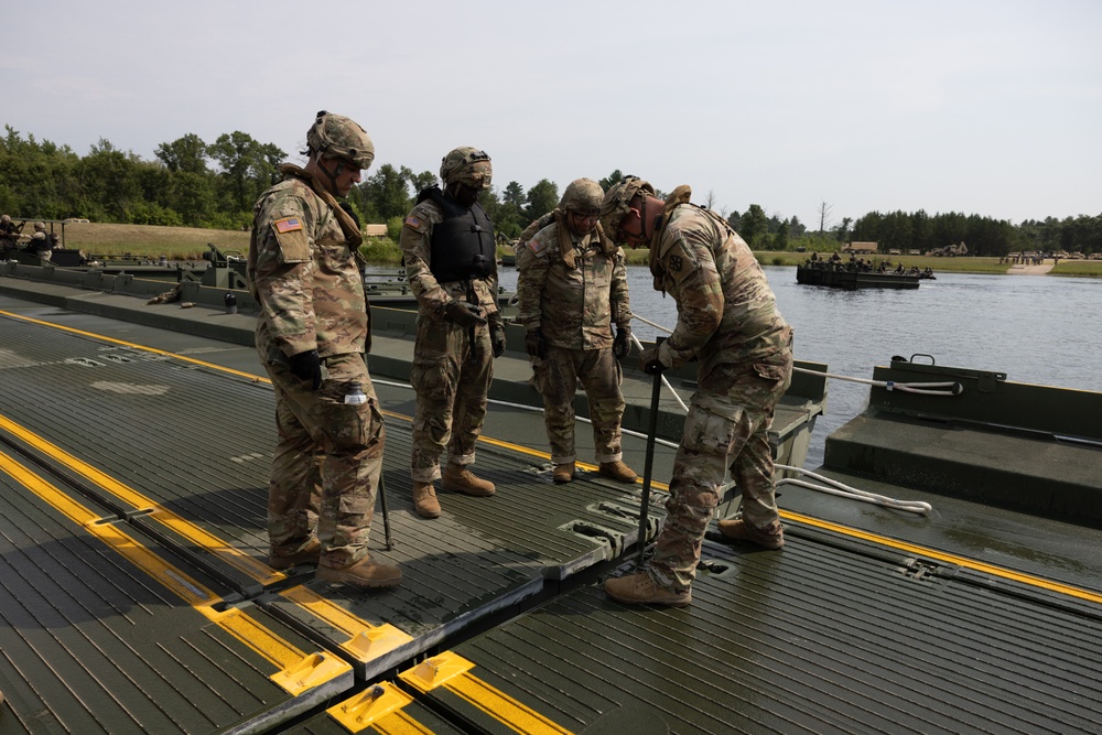 Soldiers Construct Bridge on Water