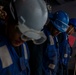 Abraham Lincoln conducts a replenishment-at-sea with USNS Earl Warren