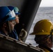 Abraham Lincoln conducts a replenishment-at-sea with USNS Earl Warren