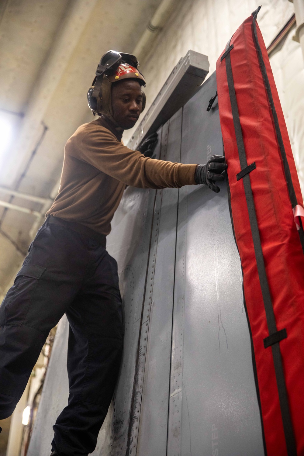 USS Gerald R. Ford (CVN 78) Sailor Conducts Maintenance
