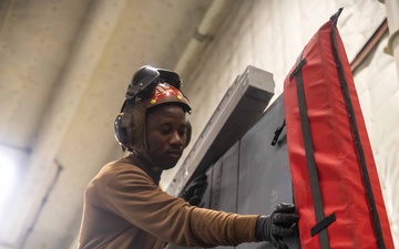 USS Gerald R. Ford (CVN 78) Sailor Conducts Maintenance
