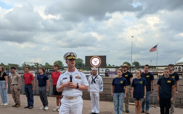 Hometown Rear Adm. Enlists 13 Future Service Members