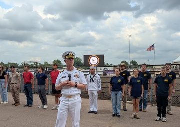 Hometown Rear Adm. Enlists 13 Future Service Members