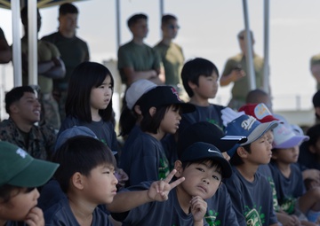 Kamimotobu After-School Children’s Club students tour Camp Schwab