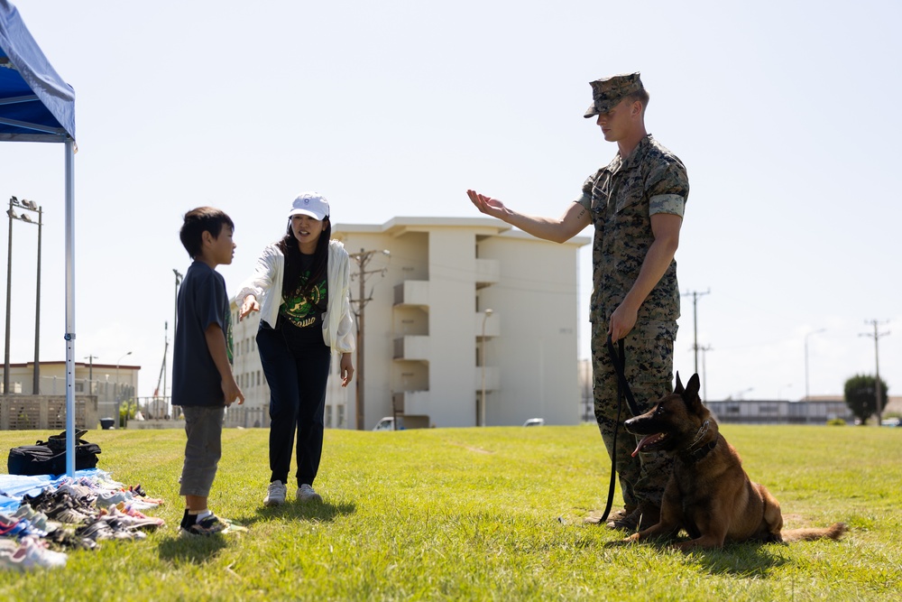 Kamimotobu After-School Children’s Club students tour Camp Schwab