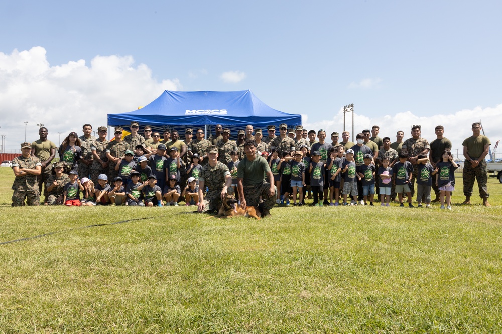 Kamimotobu After-School Children’s Club students tour Camp Schwab
