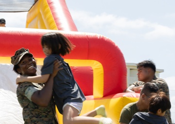 Kamimotobu After-School Children’s Club students tour Camp Schwab