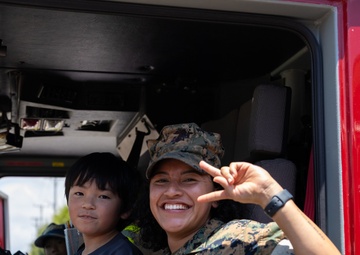 Kamimotobu After-School Children’s Club students tour Camp Schwab