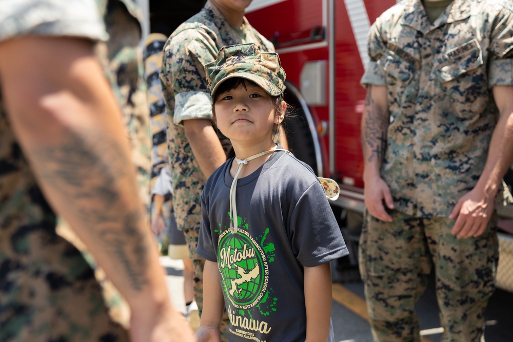 Kamimotobu After-School Children’s Club students tour Camp Schwab
