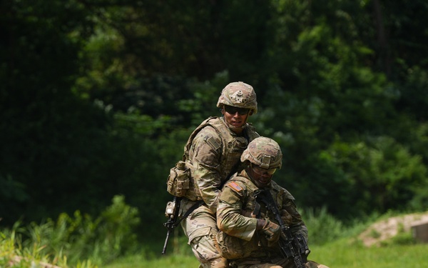 Soldiers assigned to the 11th Engineer Battalion conducts live fire training exercise