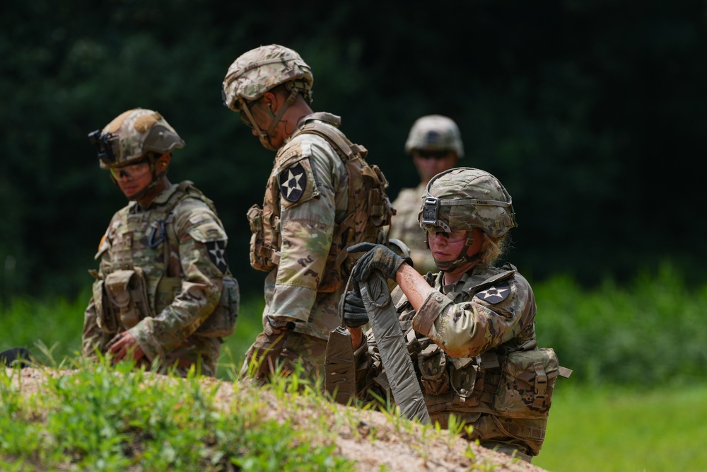Soldiers assigned to the 11th Engineer Battalion conducts live fire training exercise