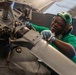 Sailors Conduct Aircraft Maintenance in the Hangar Bay Aboard George Washington