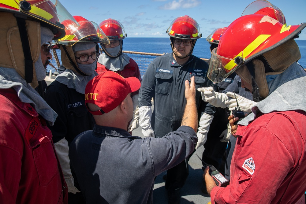 USS Mitscher (DDG 57) Sailors conduct damage control training