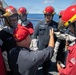 USS Mitscher (DDG 57) Sailors conduct damage control training