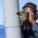 USS Mitscher (DDG 57) Sailor stands aft lookout