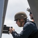 USS Mitscher (DDG 57) Sailors conduct small arms live fire exercise