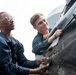 USS Mitscher (DDG 57) Sailors secure for sea