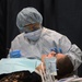 Army Reserve and Air National Guard personnel provide medical support during Health Broome