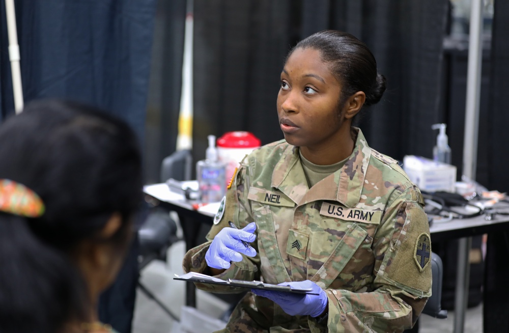 Army Reserve and Air National Guard personnel provide medical support during Health Broome