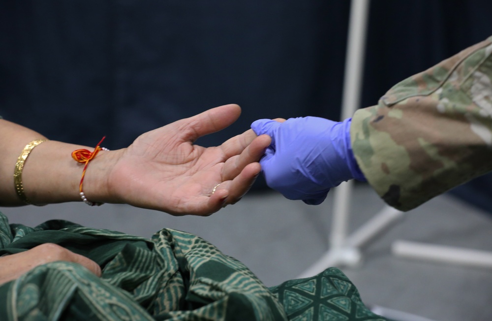 Army Reserve and Air National Guard personnel provide medical support during Health Broome