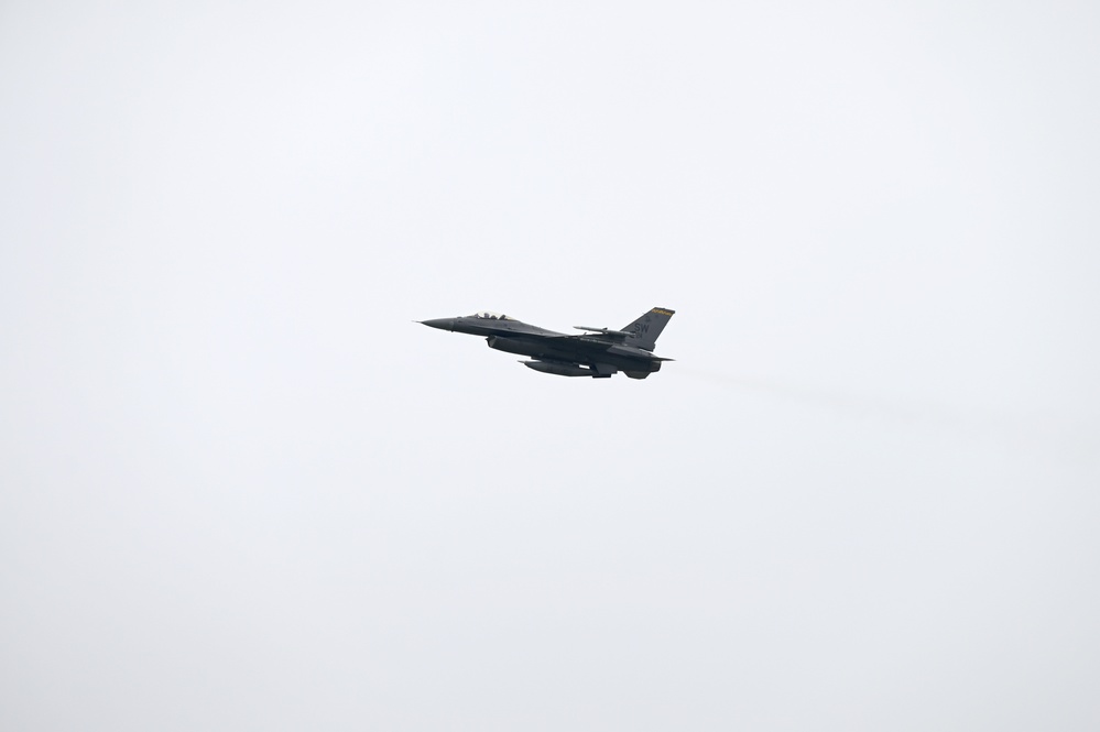 77th FS flies against grey skies