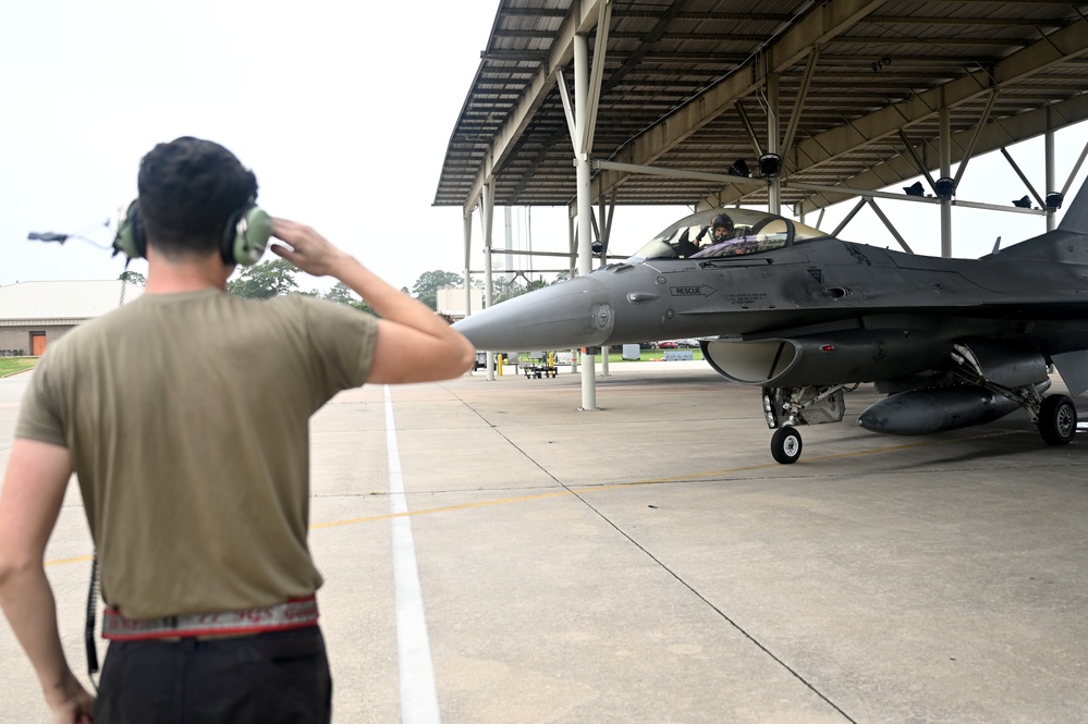 77th FS flies against grey skies