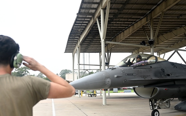 77th FS flies against grey skies