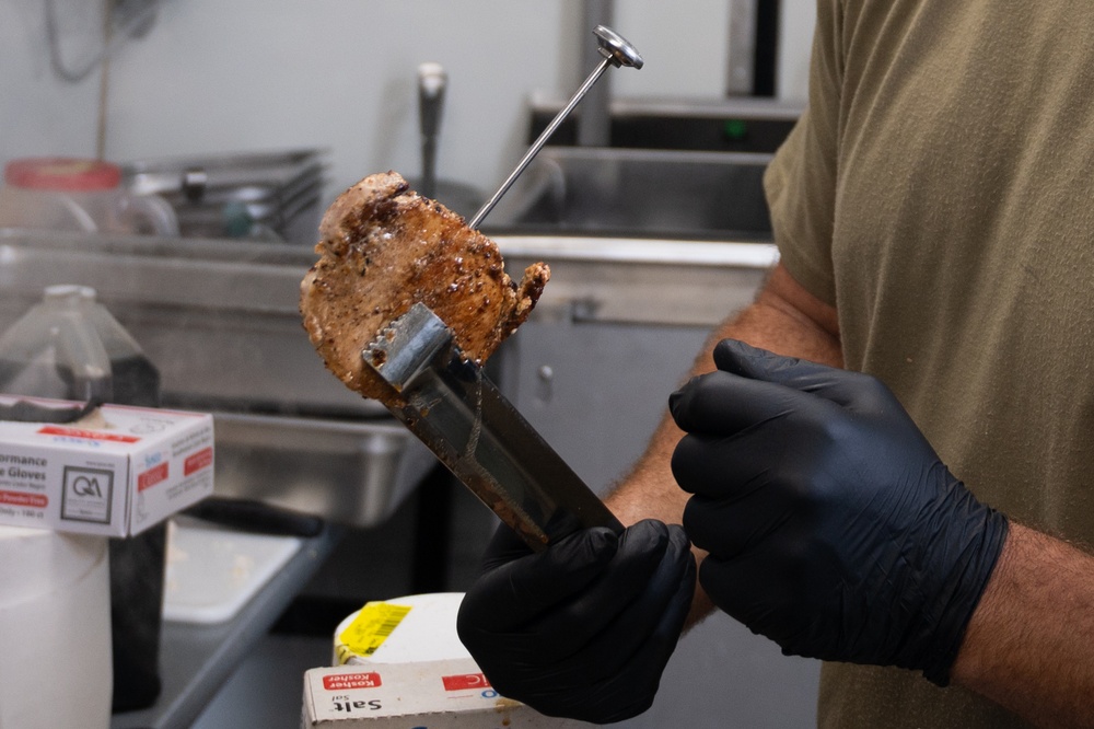131st Bomb Wing Airmen practice interoperability with Marines in expeditionary kitchen