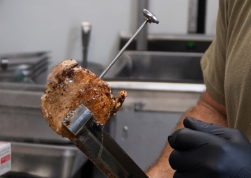 131st Bomb Wing Airmen practice interoperability with Marines in expeditionary kitchen