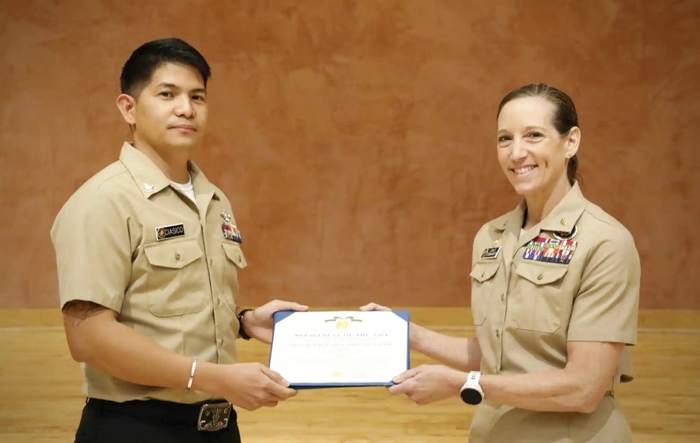 Corpsman Up: Naval Medical Research Command Medical Tech Administers Emergency Aid Mid-Flight; Receives Award for Actions