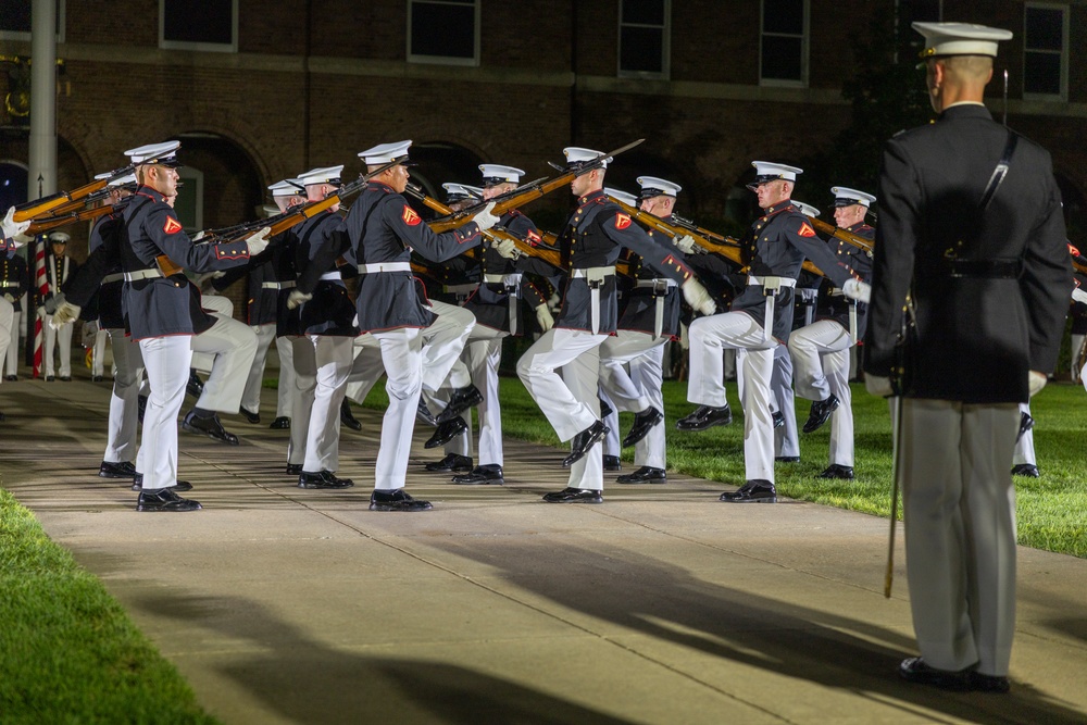 Mr. Greg Norman attends Evening Parade as Guest of Honor