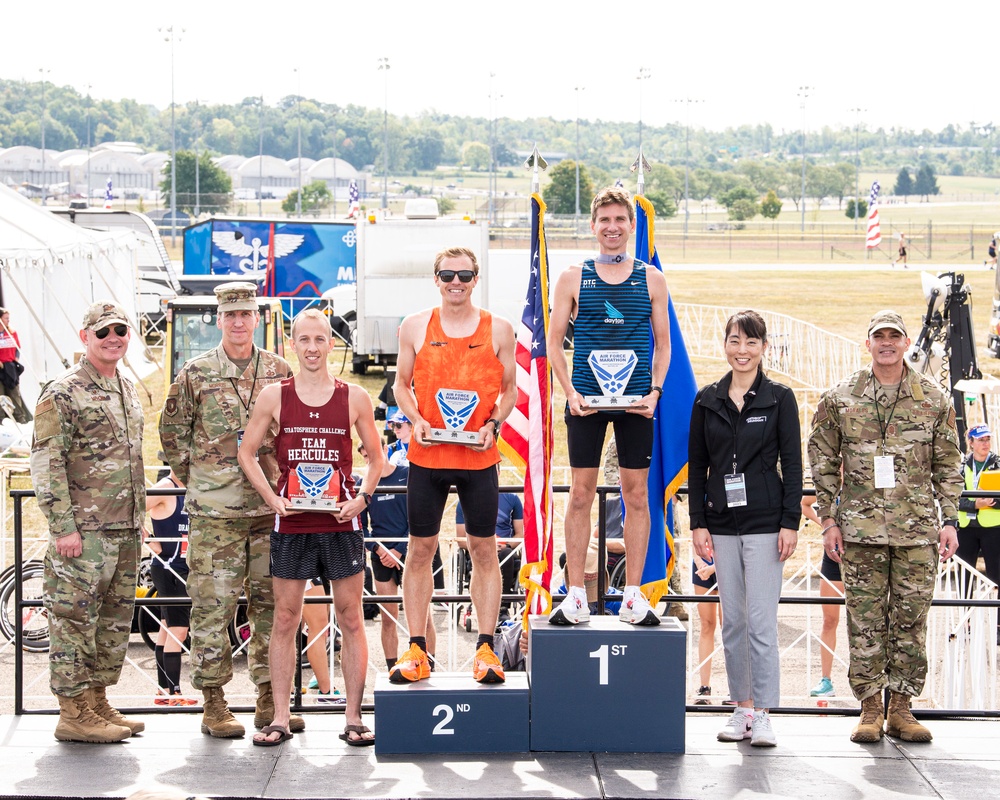 Maj. Brett Lechtenberg, 377th Comptroller Squadron director of operations, stands on the podium after placing third in the men’s division during the 27th Annual Air Force Marathon at Wright-Patterson Air Force Base.