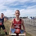 Maj. Brett Lechtenberg, 377th Comptroller Squadron director of operations, holds two trophies after completing the 27th Annual Air Force Marathon at Wright-Patterson Air Force Base.