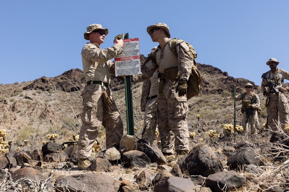 Marines place signs at Yuma NDA