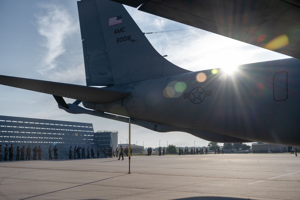 Maintenance Airmen sweep flightline for FOD