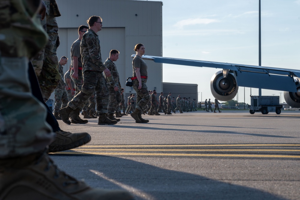 Maintenance Airmen sweep flightline for FOD