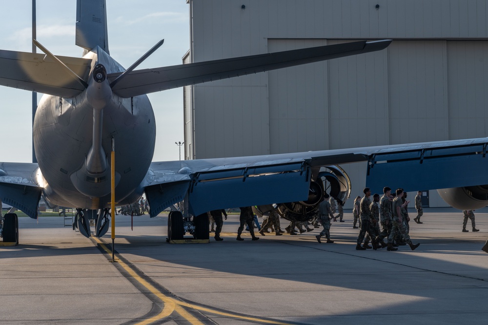Maintenance Airmen sweep flightline for FOD