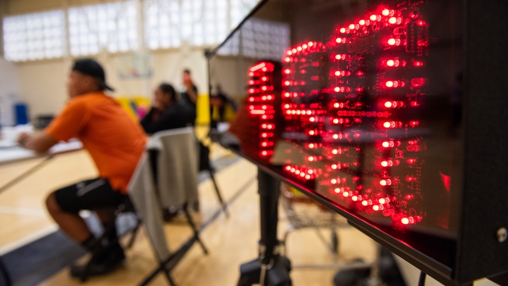 On the court at Travis: Three-on-Three and Three-point Showdown