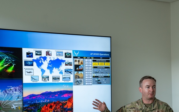 Master Sgt. Nathaniel Vezina addresses Airmen assigned to the Nevada Air National Guard Base and staffers from Sen. Jacky Rosen's Office during a Nevada Air National Guard base visit Aug. 12, 2025