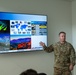 Master Sgt. Nathaniel Vezina addresses Airmen assigned to the Nevada Air National Guard Base and staffers from Sen. Jacky Rosen's Office during a Nevada Air National Guard base visit Aug. 12, 2025