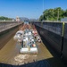 Dredge transits through McAlpine Lock