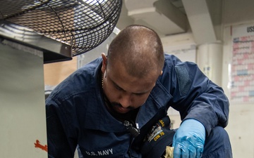 Ronald Reagan Sailors Apply New Deck Coating