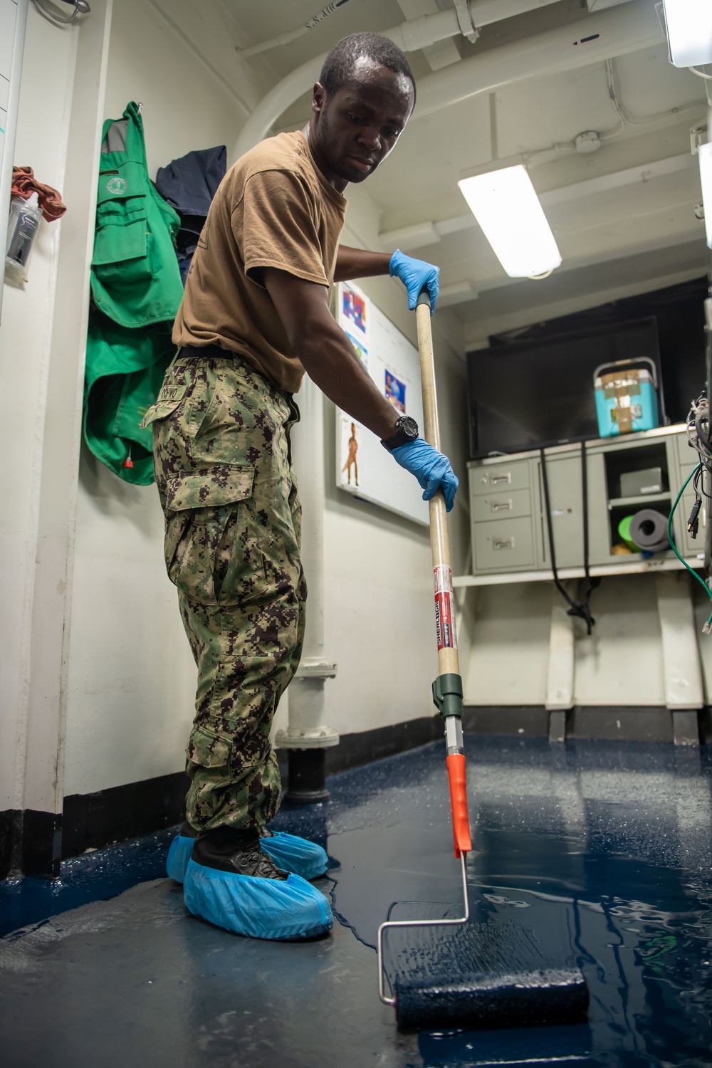 Ronald Reagan Sailors Apply New Deck Coating