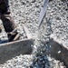 Marines and Sailors lay out rocks with a non-federal entity