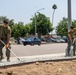Marines and Sailors lay out rocks with a non-federal entity