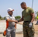 Marines and Sailors lay out rocks with a non-federal entity