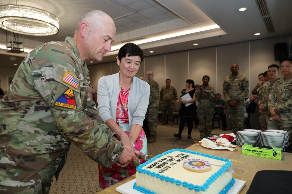 403rd AFSB commander Col. Henry Brown relinquishes command to Col. Jason Book in change of command ceremony