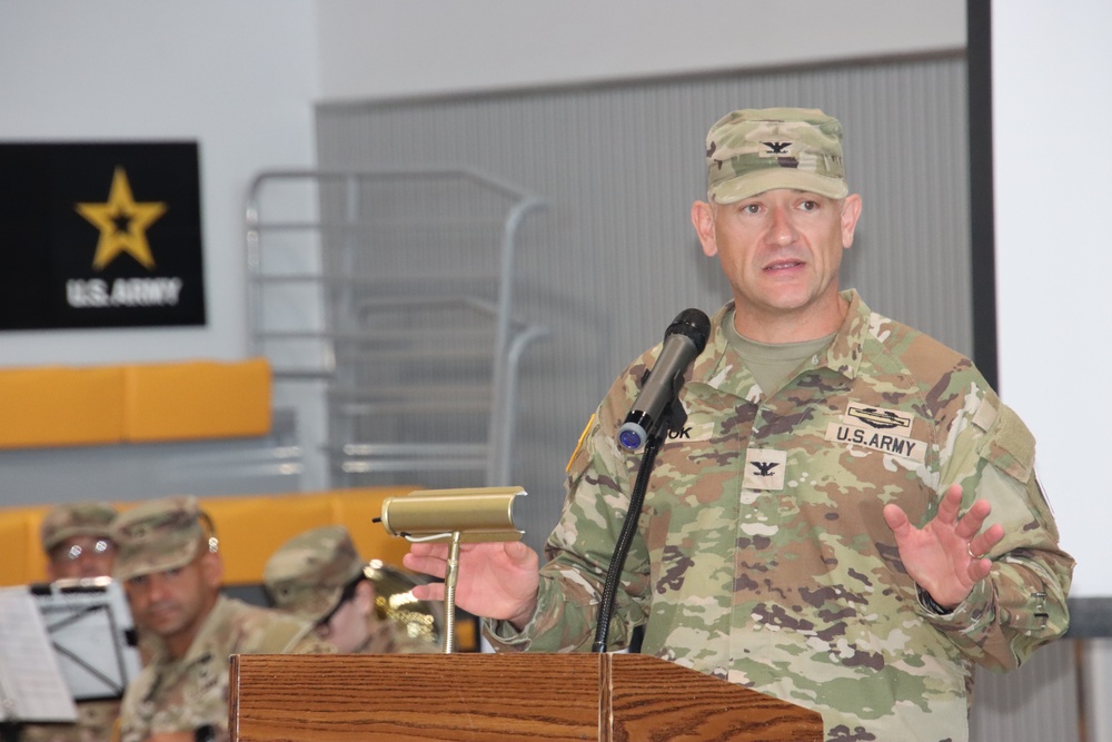 403rd AFSB commander Col. Henry Brown relinquishes command to Col. Jason Book in change of command ceremony